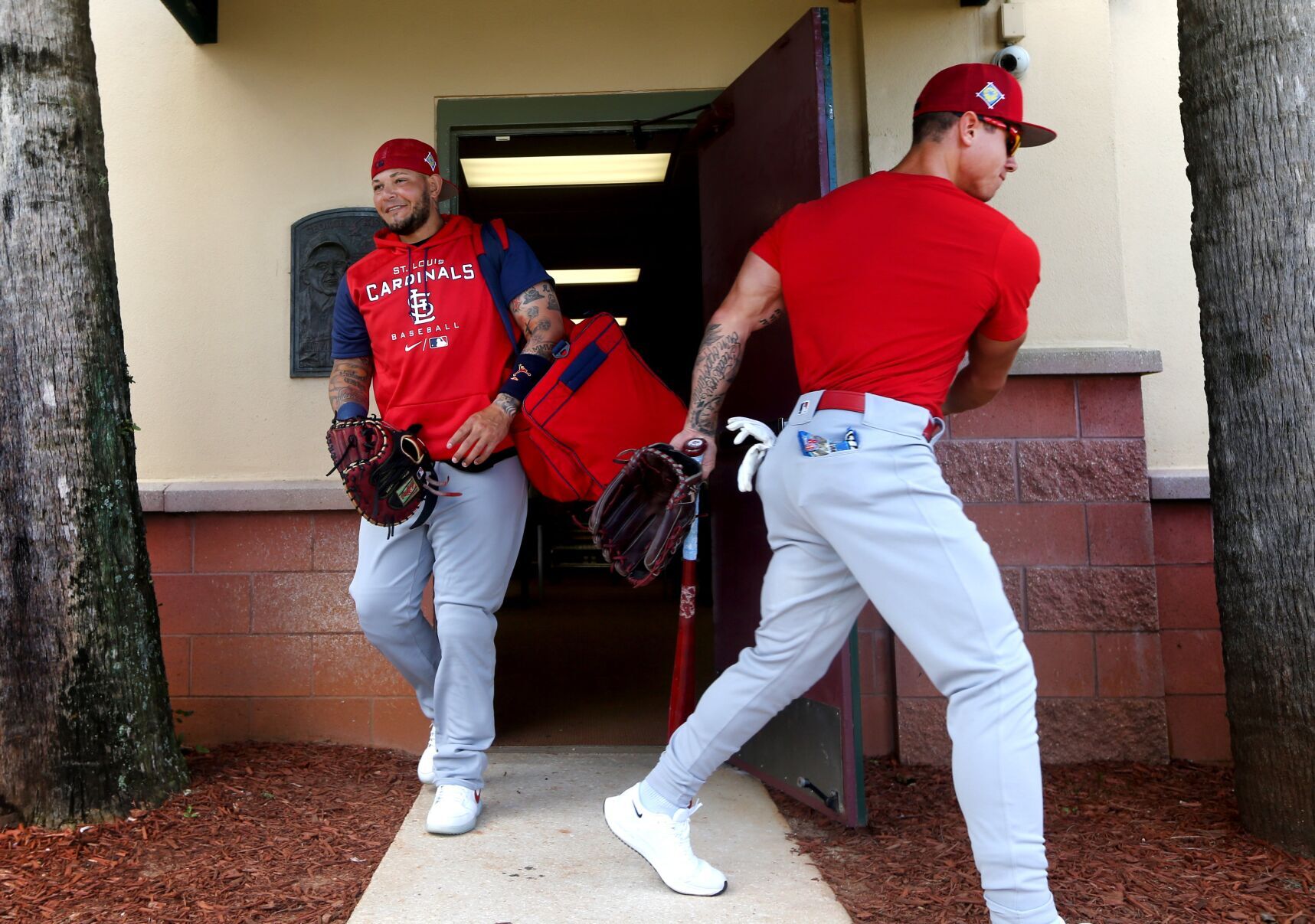 St. Louis Cardinals catcher Yadier Molina arrives on day 8 of team workouts in Jupiter